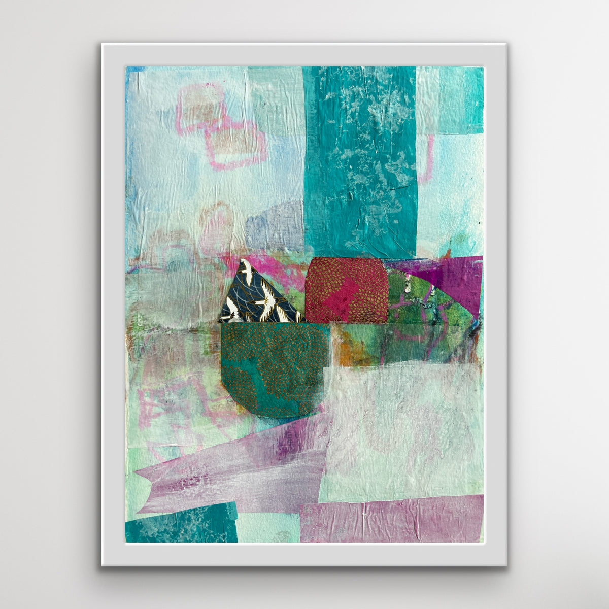 pink, teal and white mixed media artwork with Japanese chiyogami paper, framed in white