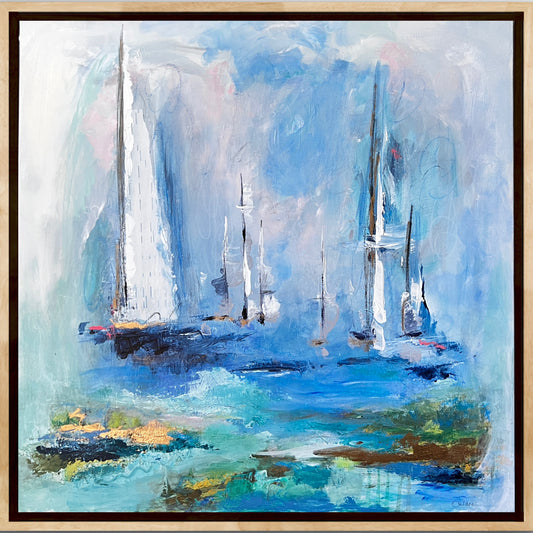 Blue, cream and gold coastal abstract mixed media painting, 20" x 20" framed in natural wood float frame. Mixed media painting with acrylic paint, gold leaf, pastel, charcoal and vintage piano roll paper collaged into the sail of an abstract sailboat. Calming coastal painting.